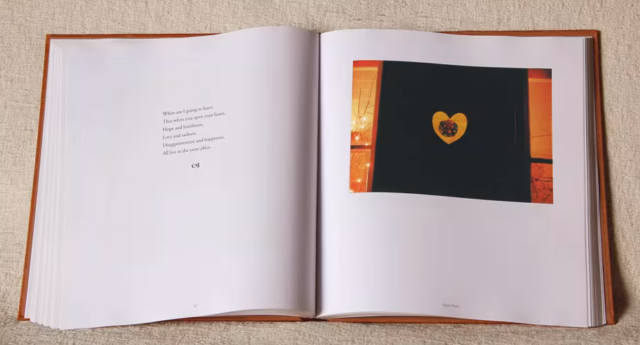 Opening Up spread — the heart in the window
